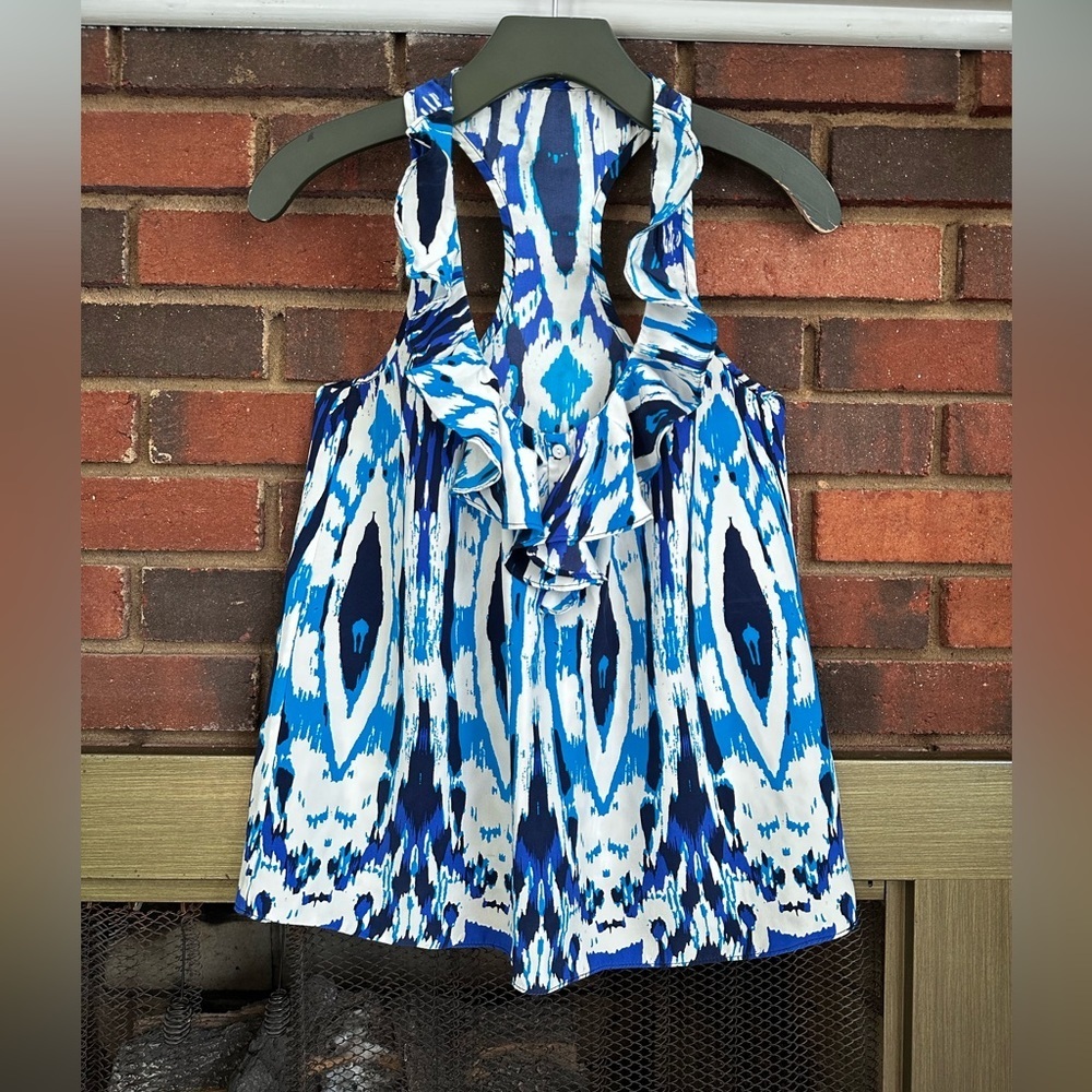 #7)  ruffles neck line and sleeveless top op. Great condition.